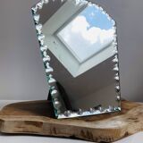 Miroir ancien ciselé en biseau