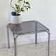 Table basse annees 70 verre et acier chromé