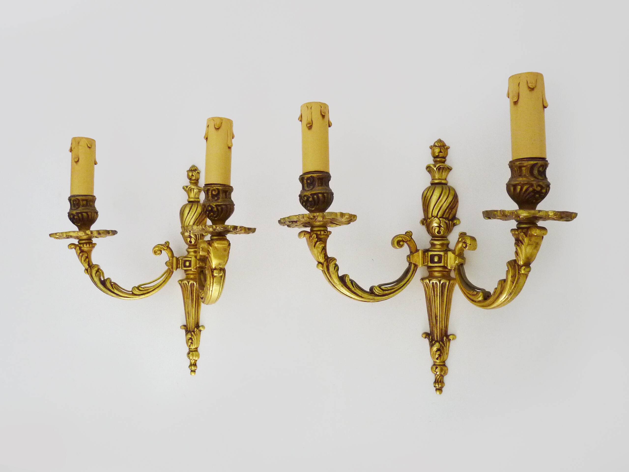 Old pair of bronze double-light wall sconces. 60s