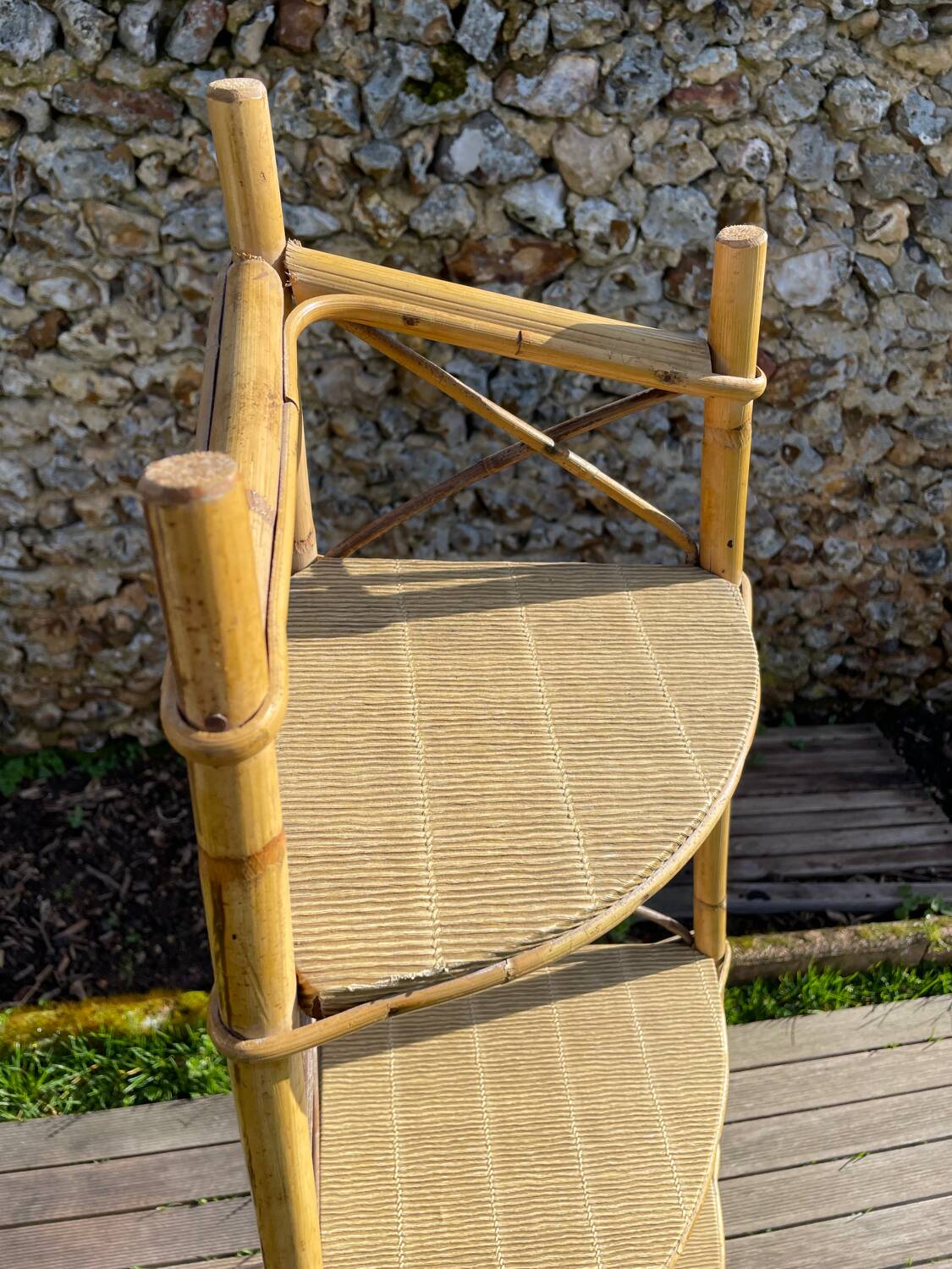 Audoux Minnet style corner shelf in vintage rattan 1950