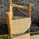 Audoux Minnet style corner shelf in vintage rattan 1950