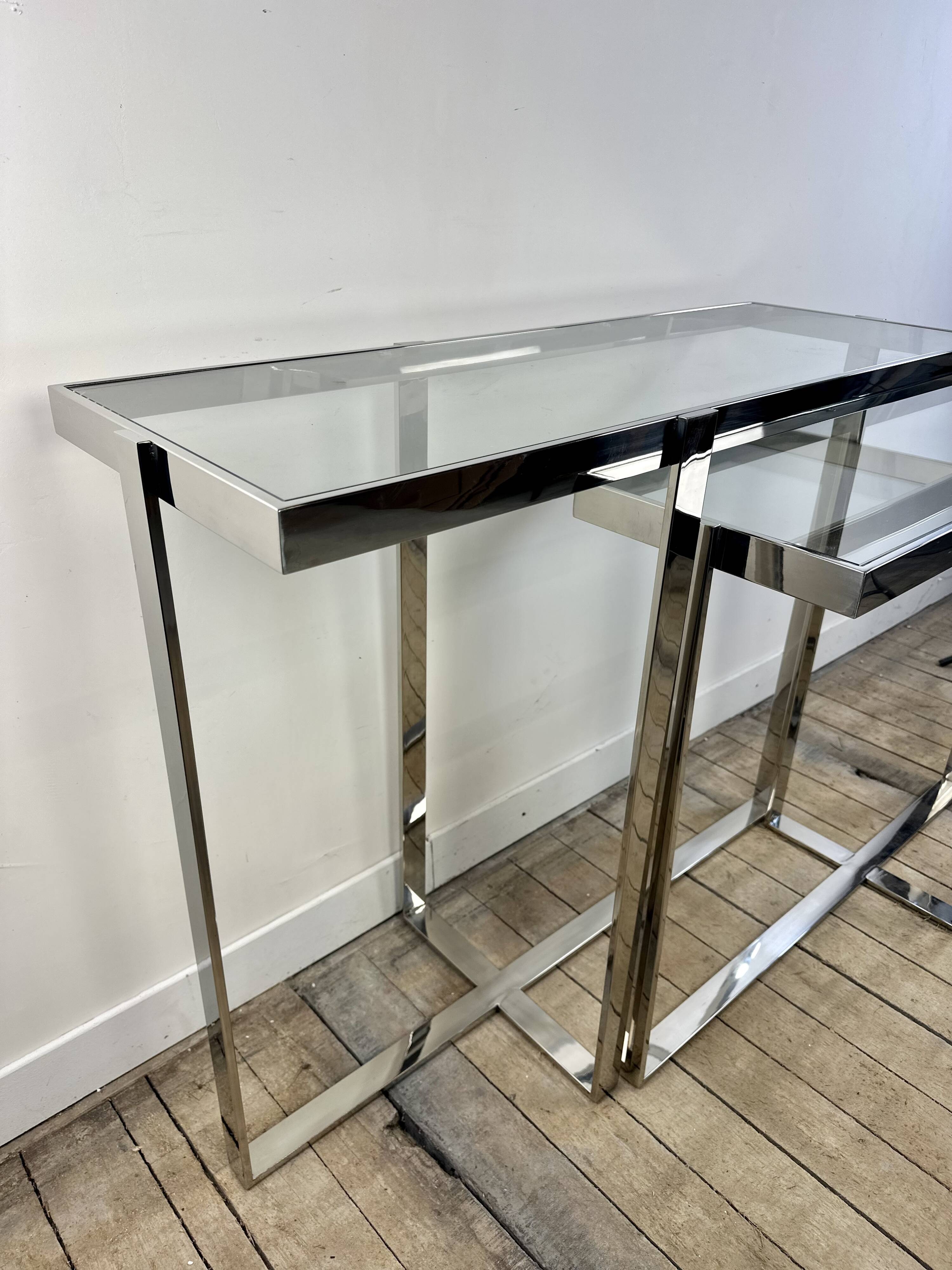 Chrome metal and glass console from the 2000s.