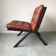 Scandinavian folding armchair in cognac leather