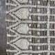 Old oval doily made by hand in beige crochet