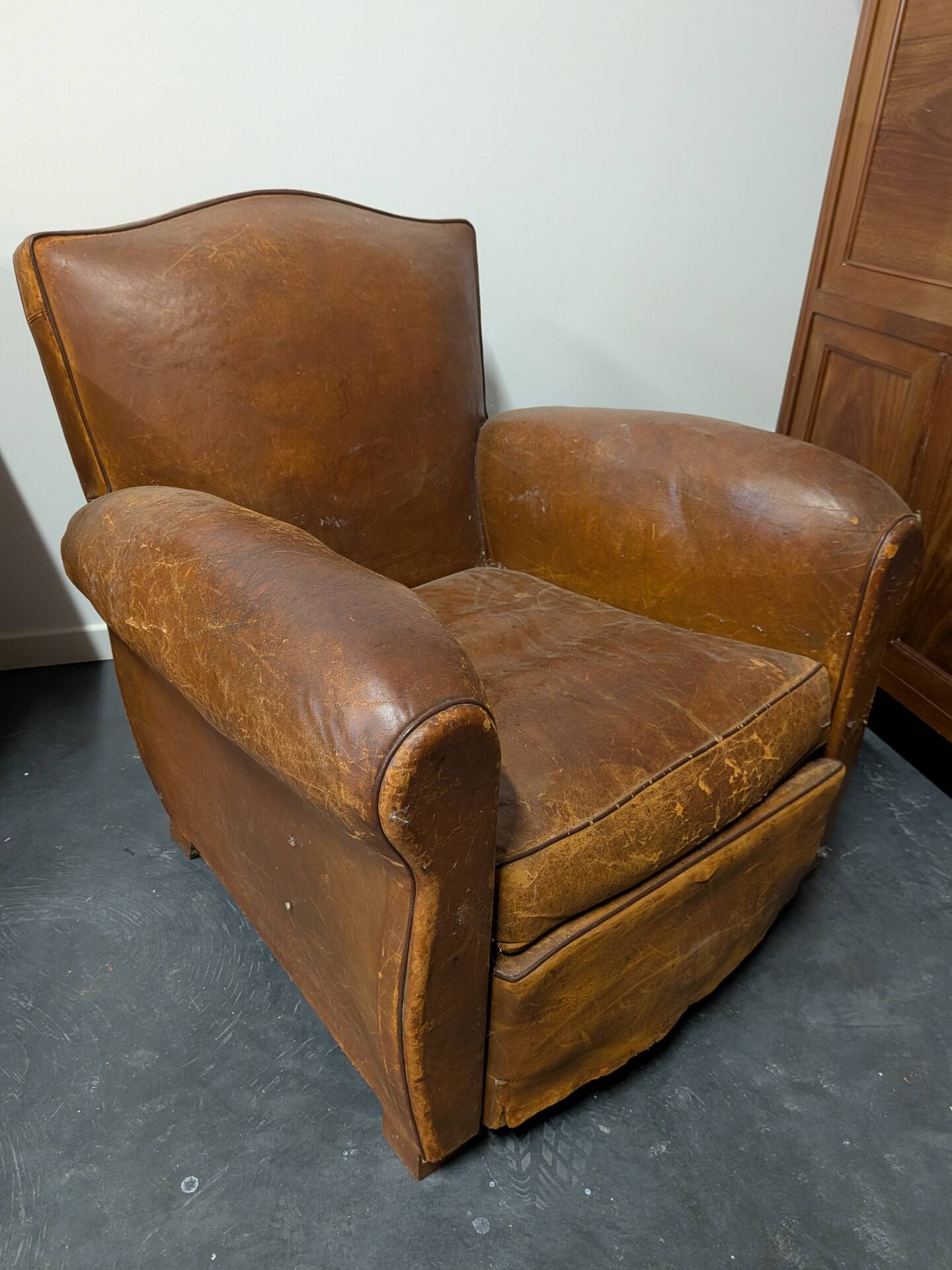 Pair of moustache club armchairs in leather, France, 1930s — to be restored.