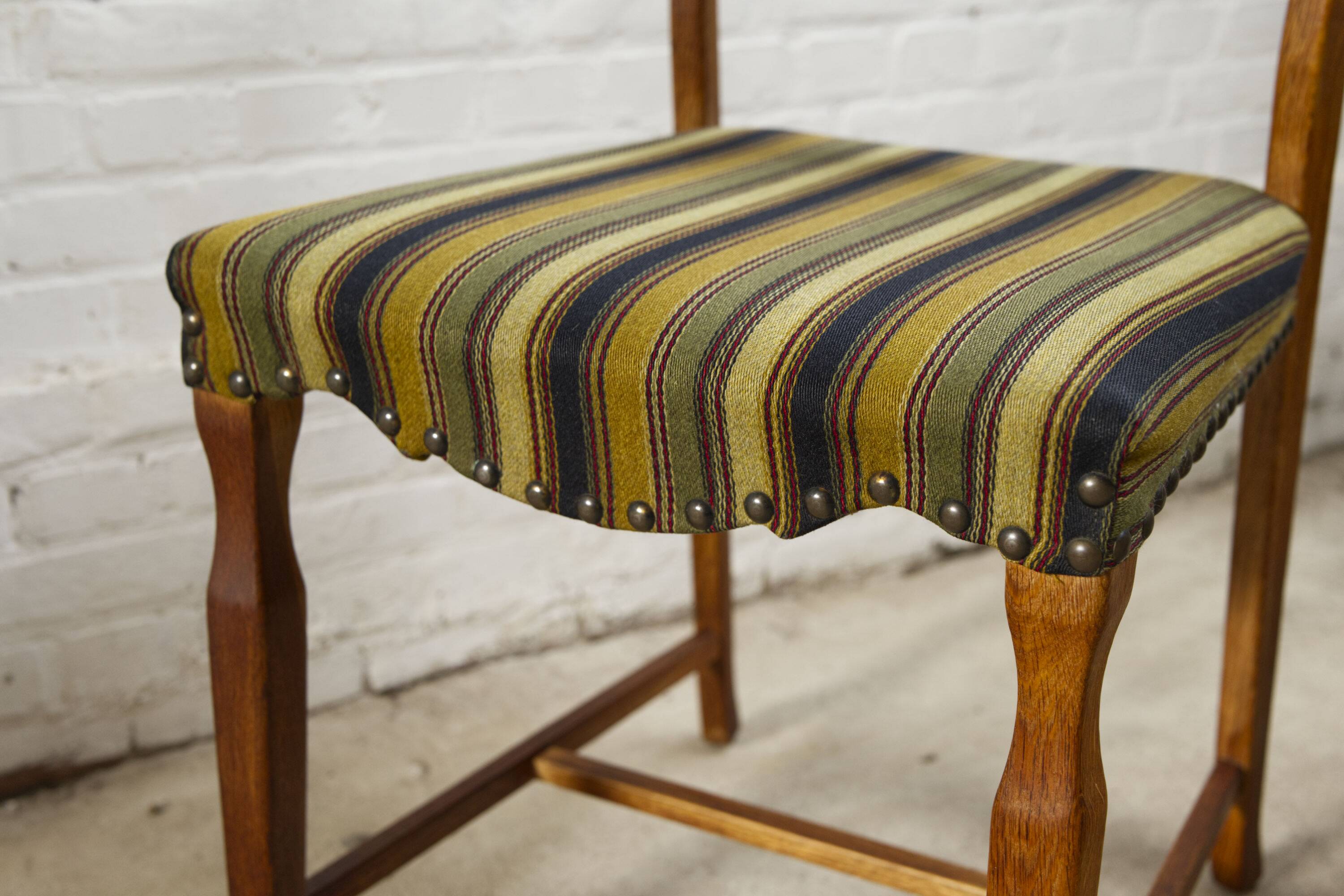 Set of four oak and wool dining room chairs by Henning Kjaernulf, 1960's