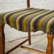 Ensemble de quatre chaises de salle à manger en chêne et laine par Henning Kjaernulf, années 1960.