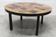 Round ceramic coffee table by Jean Gregorieff