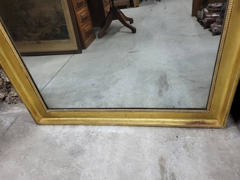 Large gilt mirror in 2 parts from the early 19th century