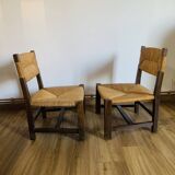 Pair of low wooden and straw armchairs