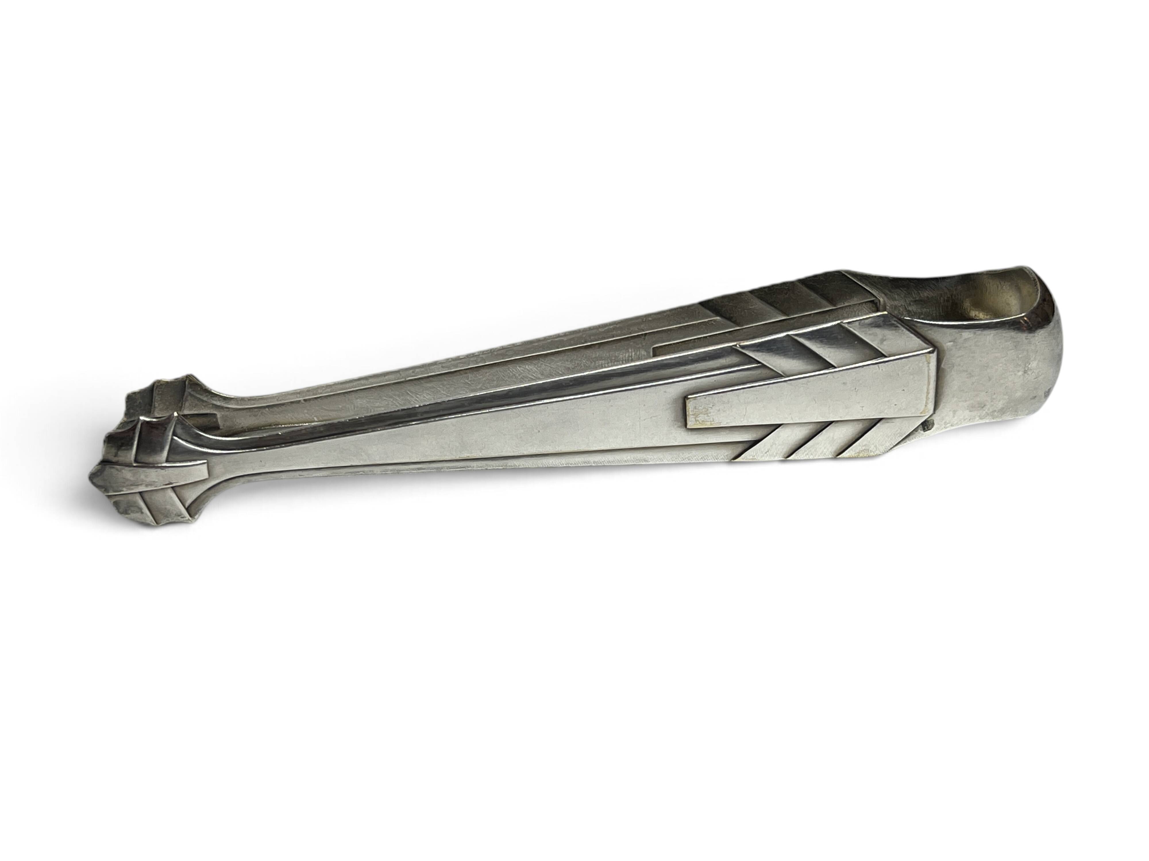 Art Deco, silver-plated sugar tongs from around 1930.