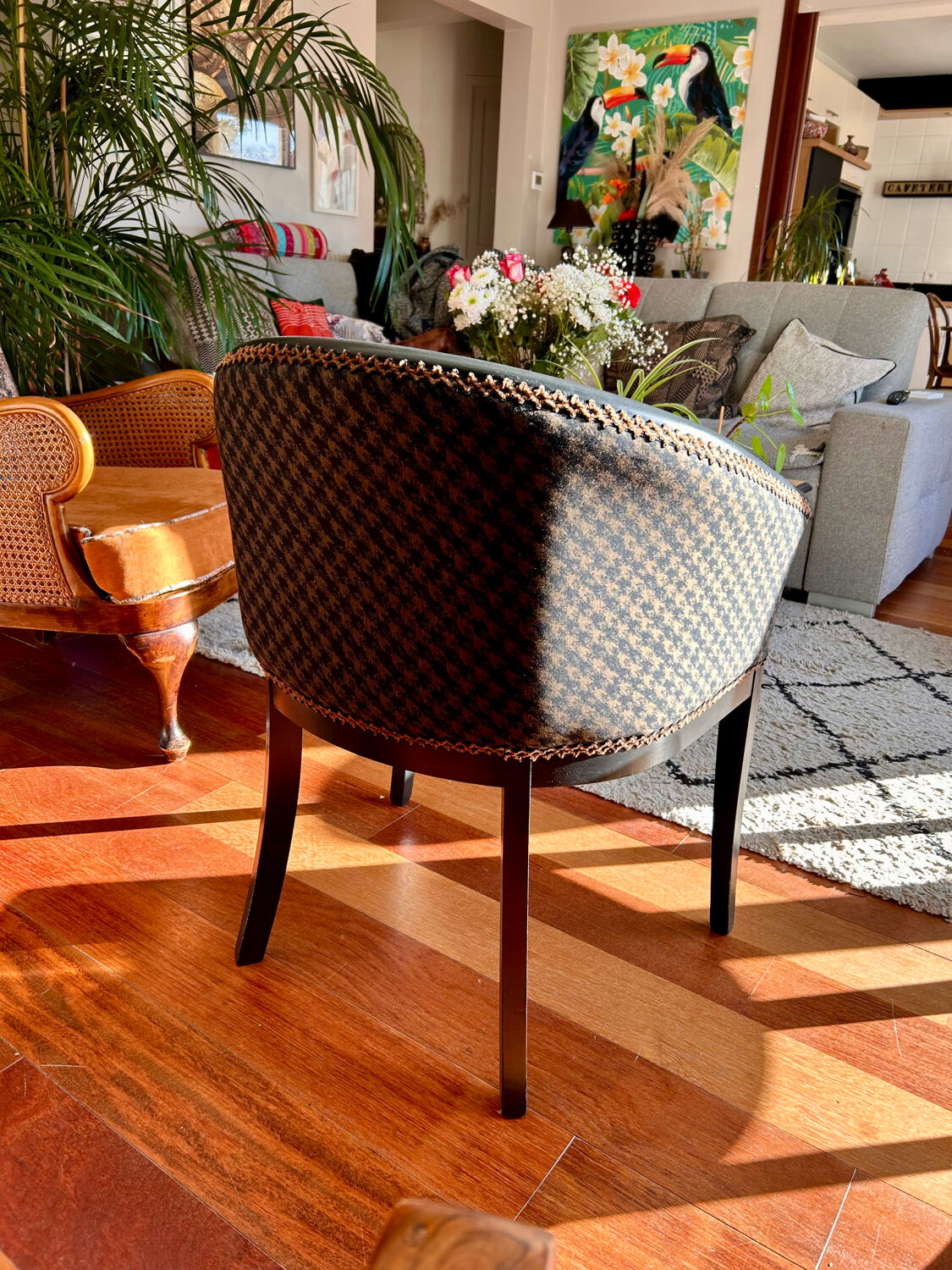 Pair of Art Deco barrel chairs in black and bronze