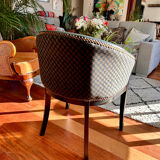 Pair of Art Deco barrel chairs in black and bronze