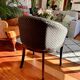 Pair of Art Deco barrel chairs in black and bronze