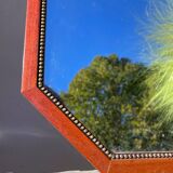 Octagonal beaded wooden mirror