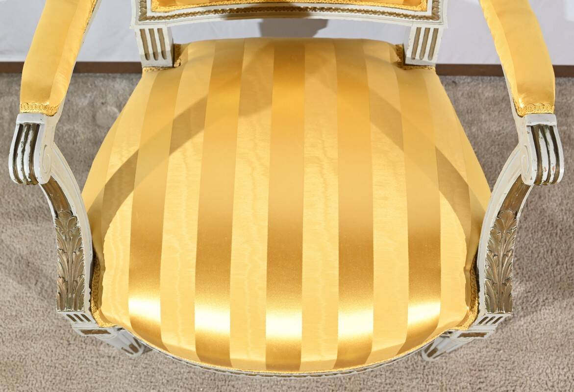 Pair of Cabriolet Armchairs, in rechampi wood, Louis XVI style – Late 19th century