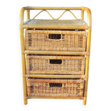 Old chest of drawers with 3 bamboo and wicker drawers.
