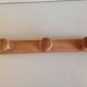Vintage three-headed wooden coat rack from the 60s and 70s