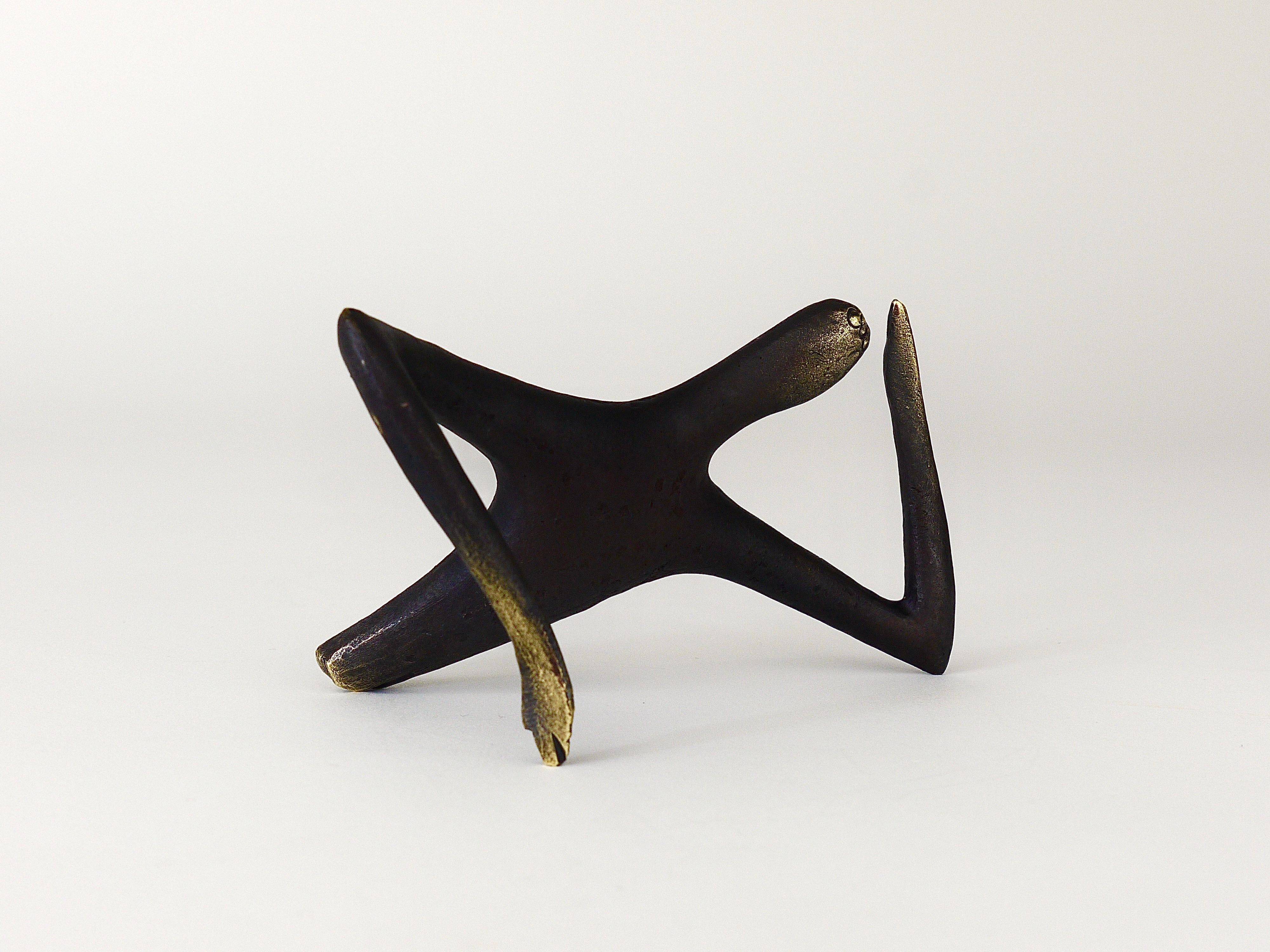 Handmade brass sculpture by Carl Auböck, Optimist Pessimist, model no. 4059.