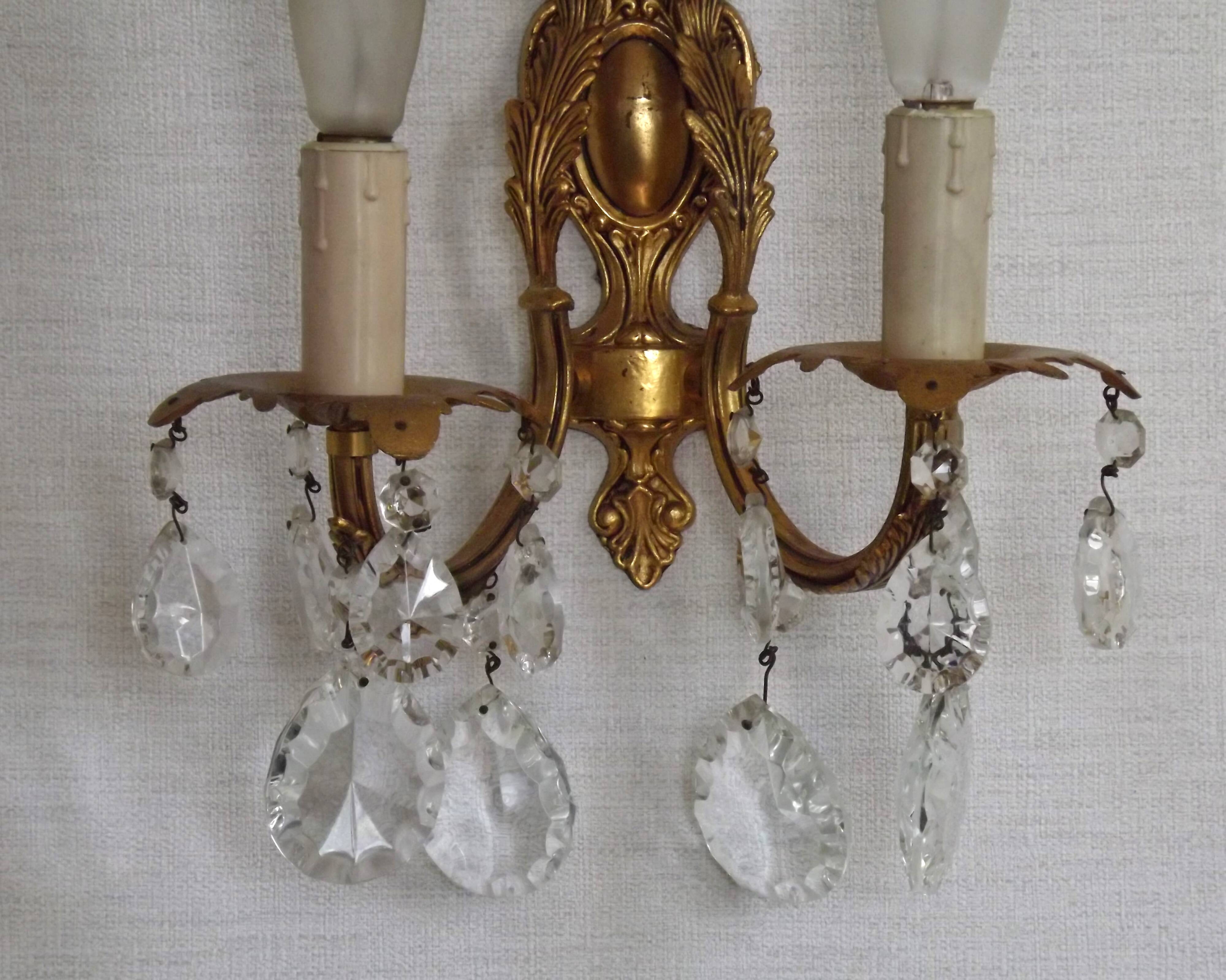 Pair of antique 2-light wall sconces in bronze with crystal pendants, Spain.