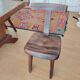 Set table, 4 chairs and a brutalist bench in the Regain style.