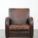Vintage sheepskin leather design armchair in a dark cognac colour