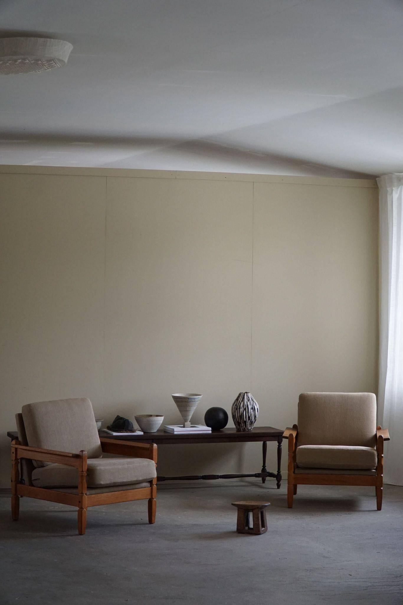 Modern Danish, Pair of Lounge Armchairs in Oak and Linen, Henning Kjærnulf, 1960s