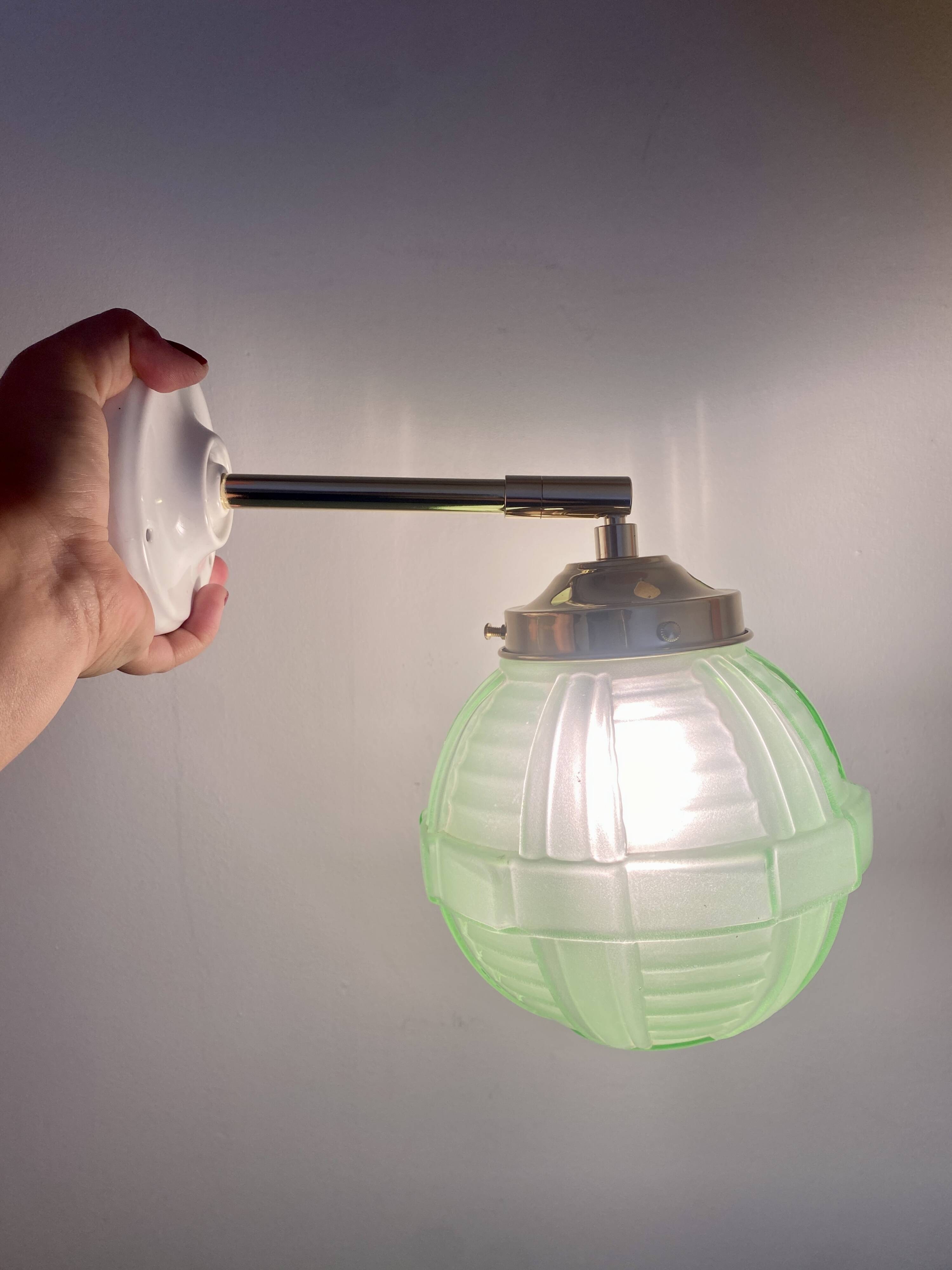 Vintage art deco globe wall light in green glass
