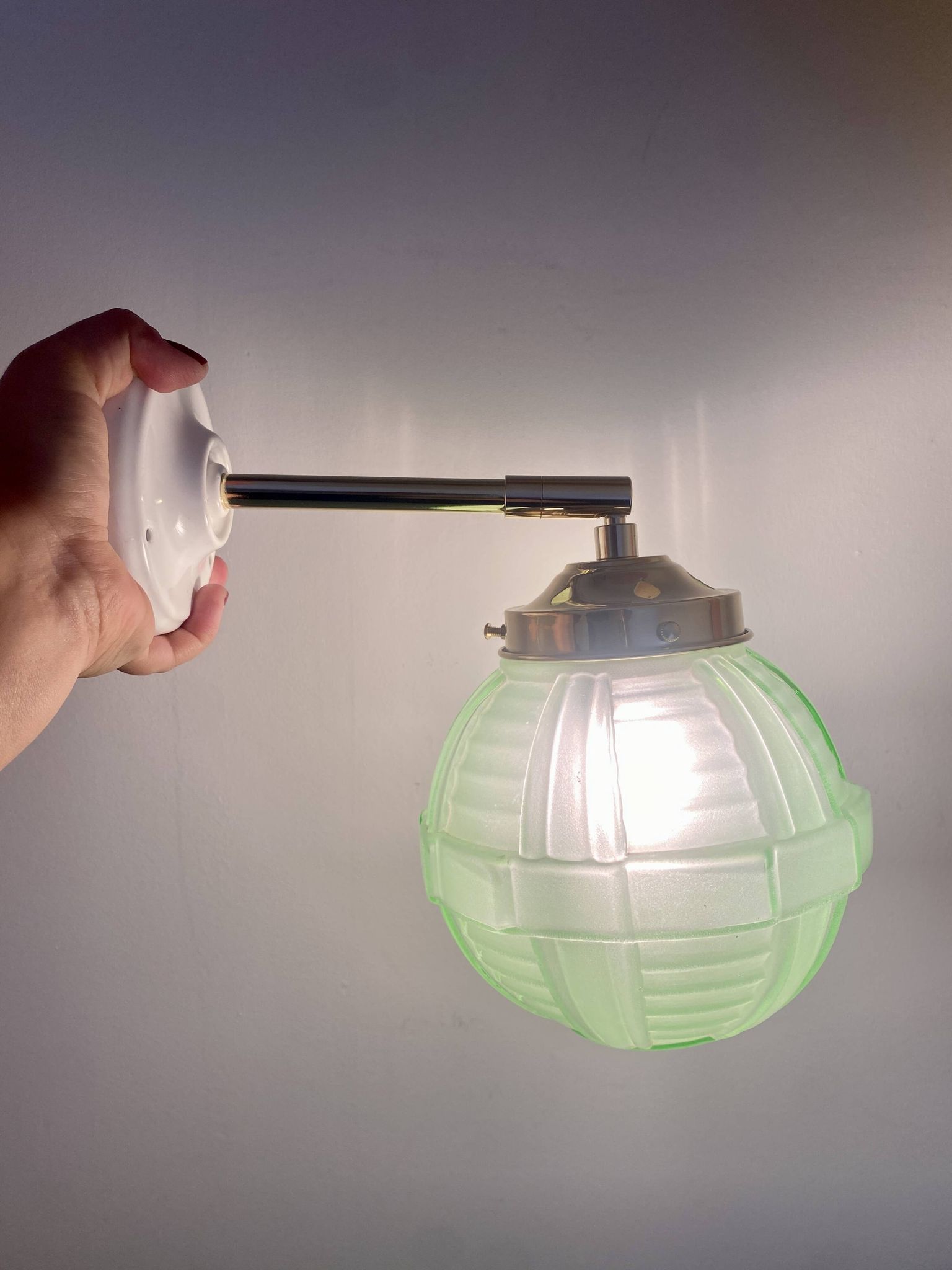 Vintage art deco globe wall light in green glass
