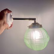 Vintage art deco globe wall light in green glass