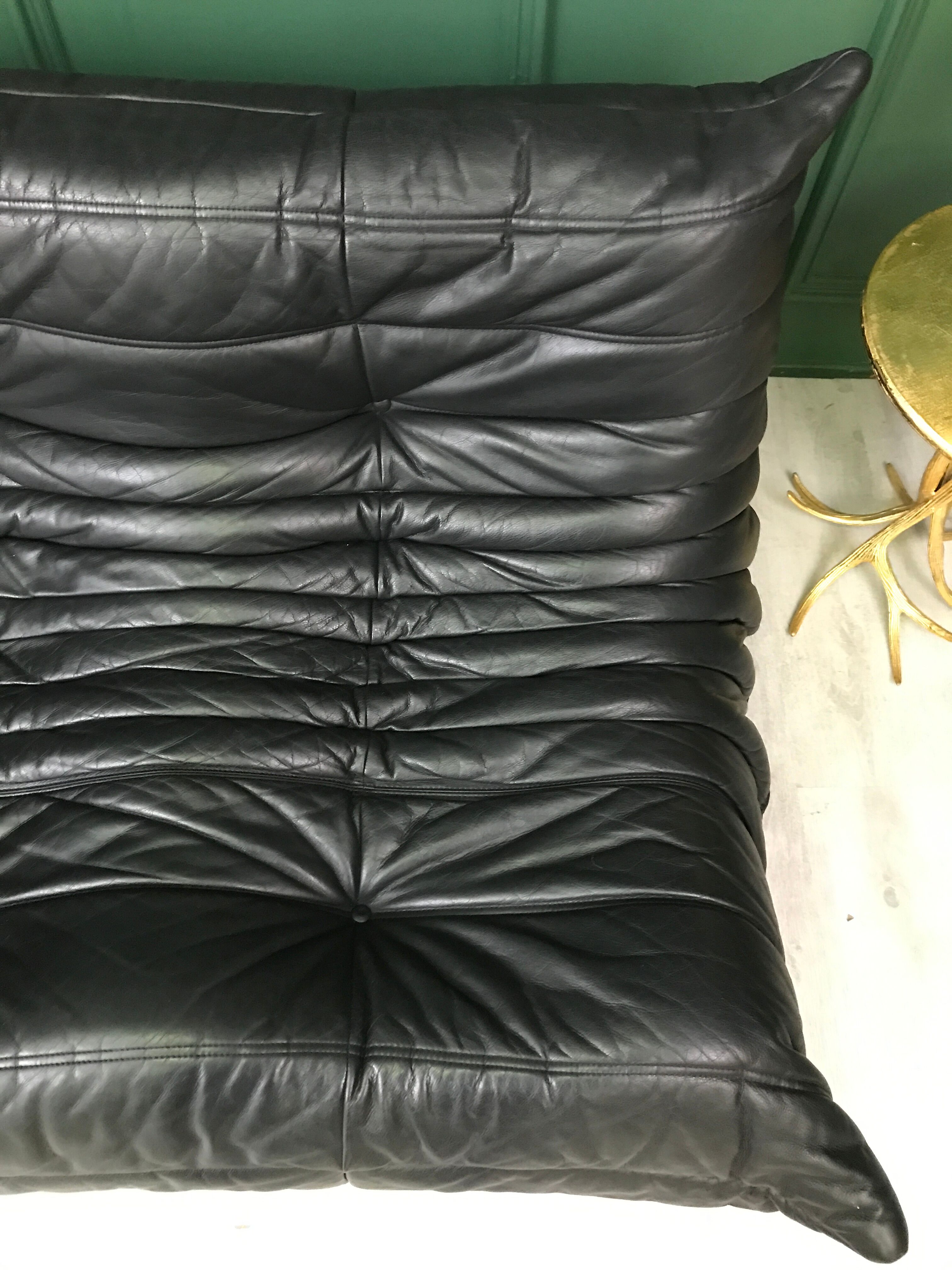 Black leather three seater sofa Togo by Ligne Roset