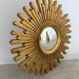 Ancien miroir soleil doré œil de sorcière bombé en résine, années 70