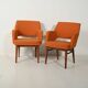 Pair of orange Oslosund armchairs by Kinnarps, 1950s