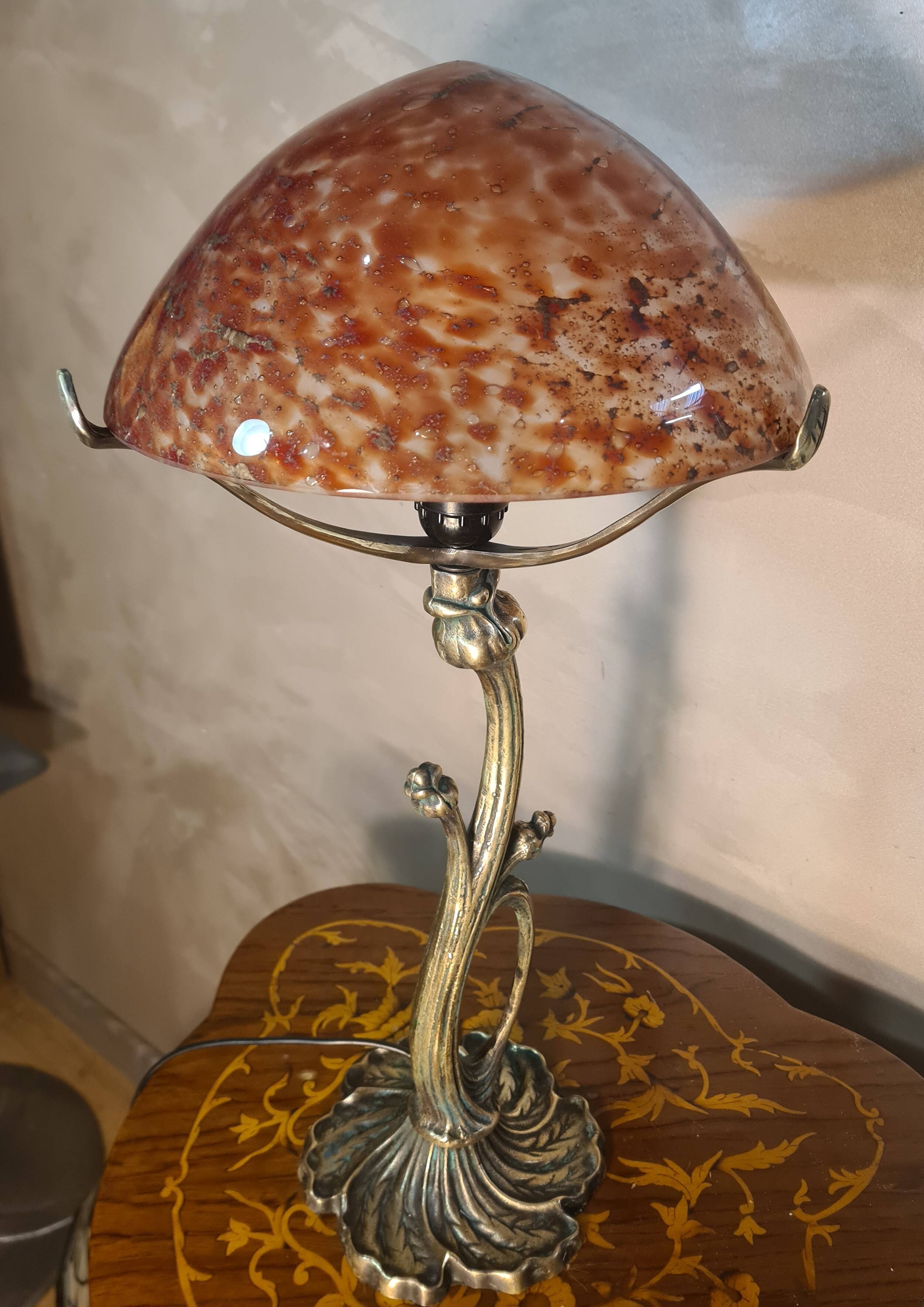 Bronze lamp in Art Nouveau style from 1975 to 1985 with a high-quality glass shade.