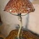 Bronze lamp in Art Nouveau style from 1975 to 1985 with a high-quality glass shade.