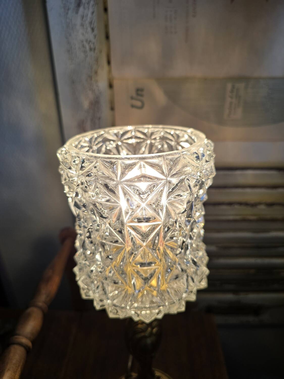 Vintage table lamp with a bronze base and moulded glass globe.