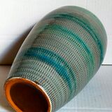 Ceramic vase scarified with gray-blue enamel