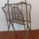 Brass magazine rack in neo-classical style, 20th century.