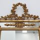 Louis XVI style gilt mirror with laurel wreath crest, Belgium, 20th century