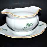 Saucière verseuse vintage en porcelaine ornée de trèfles vert
