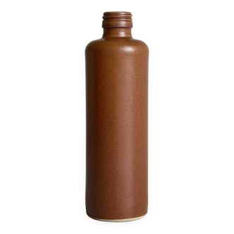 Decorative brown ceramic bottle.