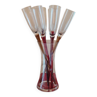 Champagne flutes in their vase