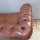Brown leather chesterfield sofa