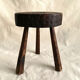 Brutalist tipode stool in carved wood