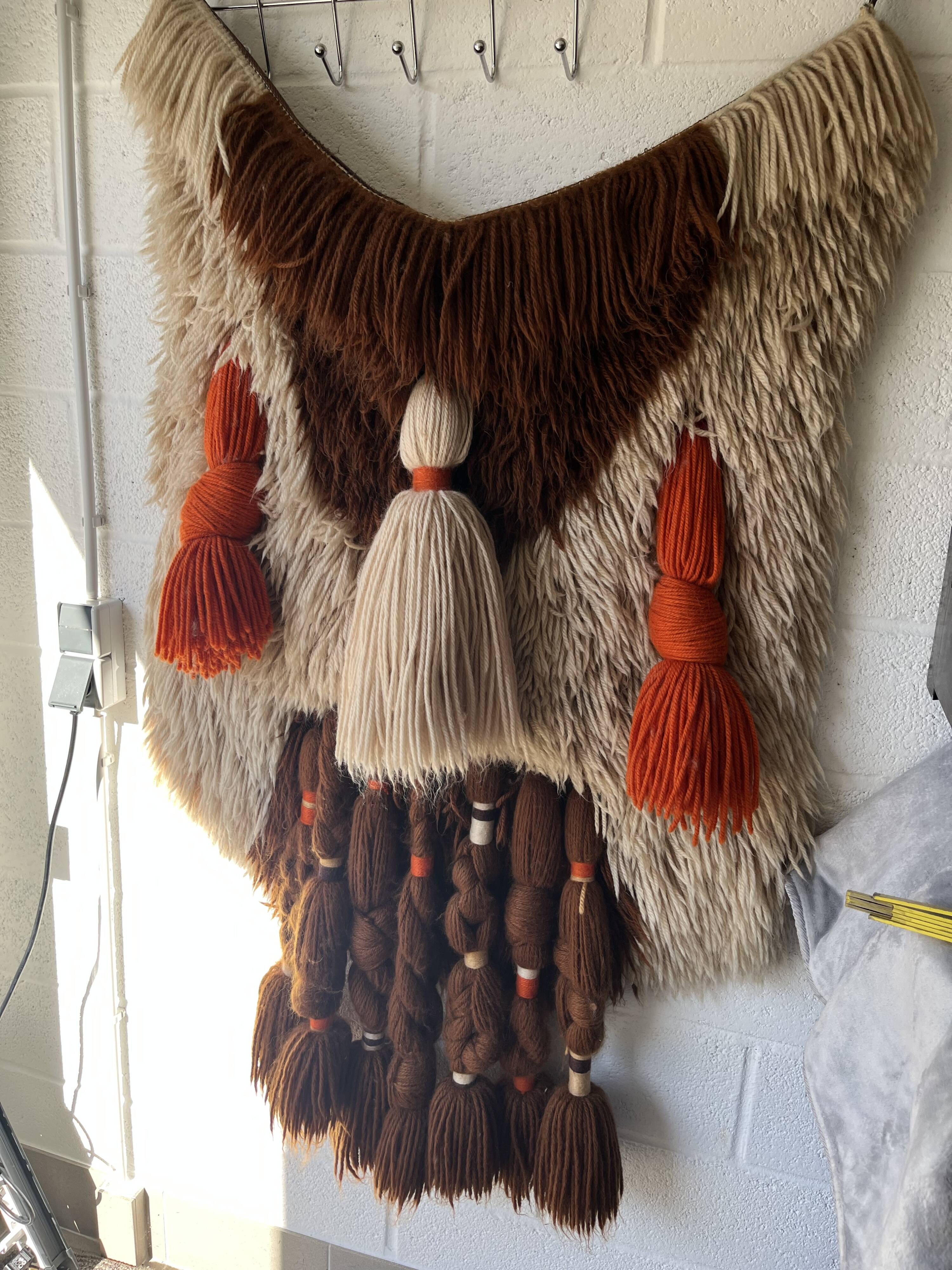 Handmade woven wool wall tapestry from the 70s and 80s, vintage macramé.