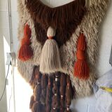 Handmade woven wool wall tapestry from the 70s and 80s, vintage macramé.