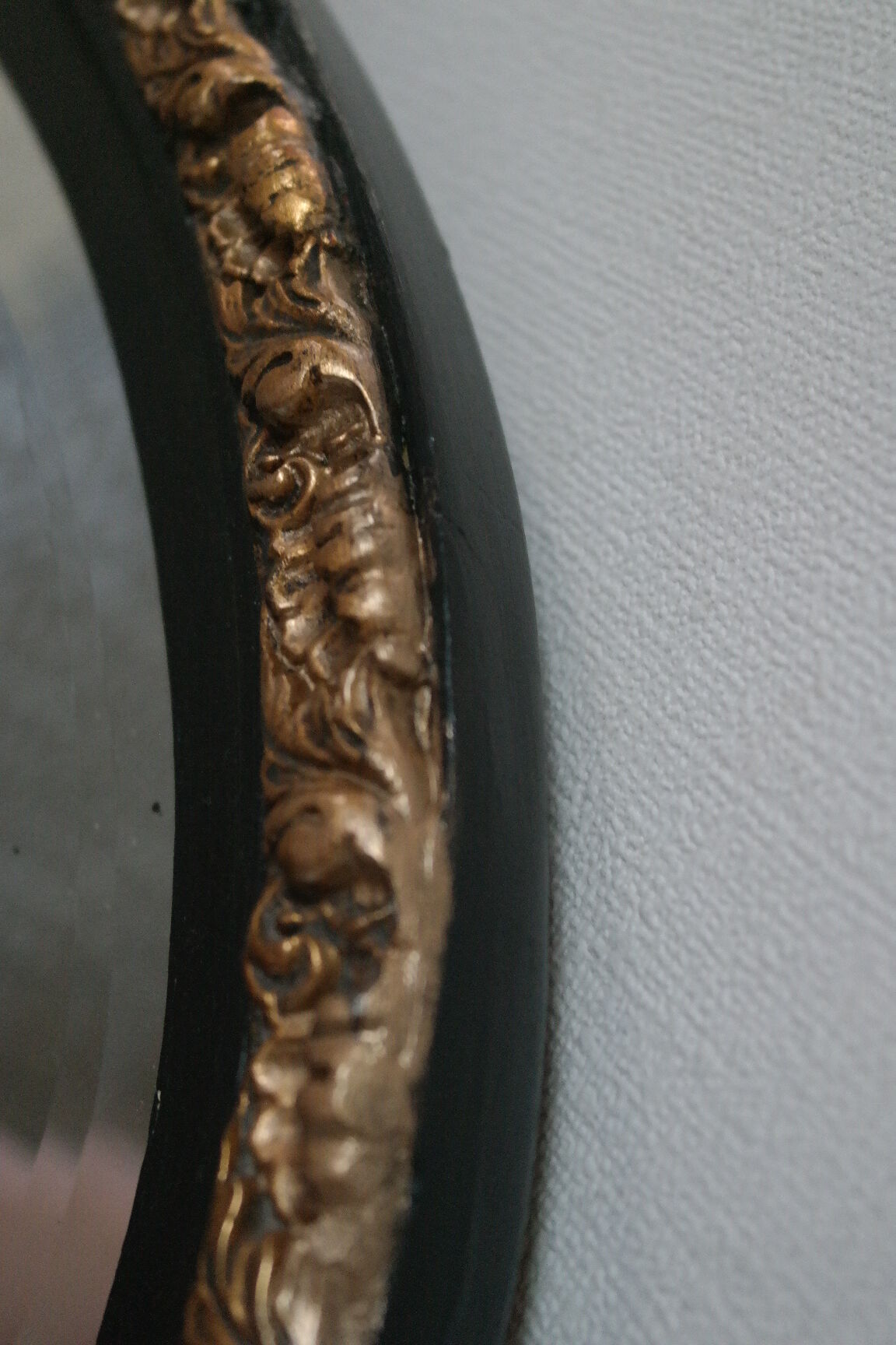 Black and gold art deco mirror