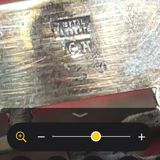 Antique sugar bowl on a stand with a lid and interior lining in velvet.