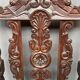 Renaissance-style oak armchair, hand-carved deep sculpture.