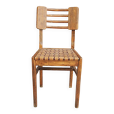 Old wooden chair in the style of Pierre Cruège.